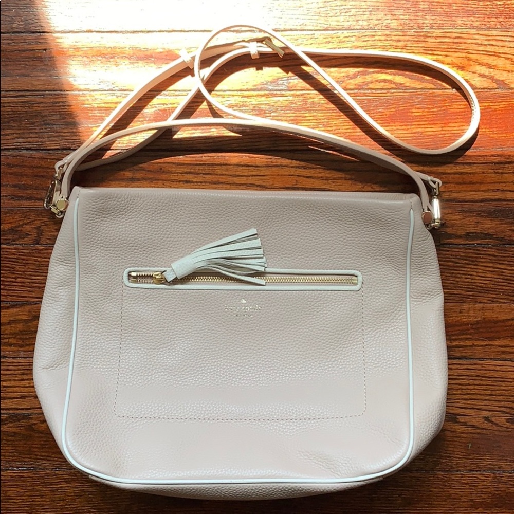Light pink Kate spade over the shoulder